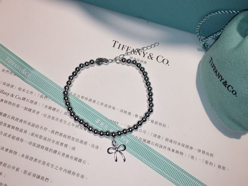 18K Tiffany Bow Charm Bead Bracelet