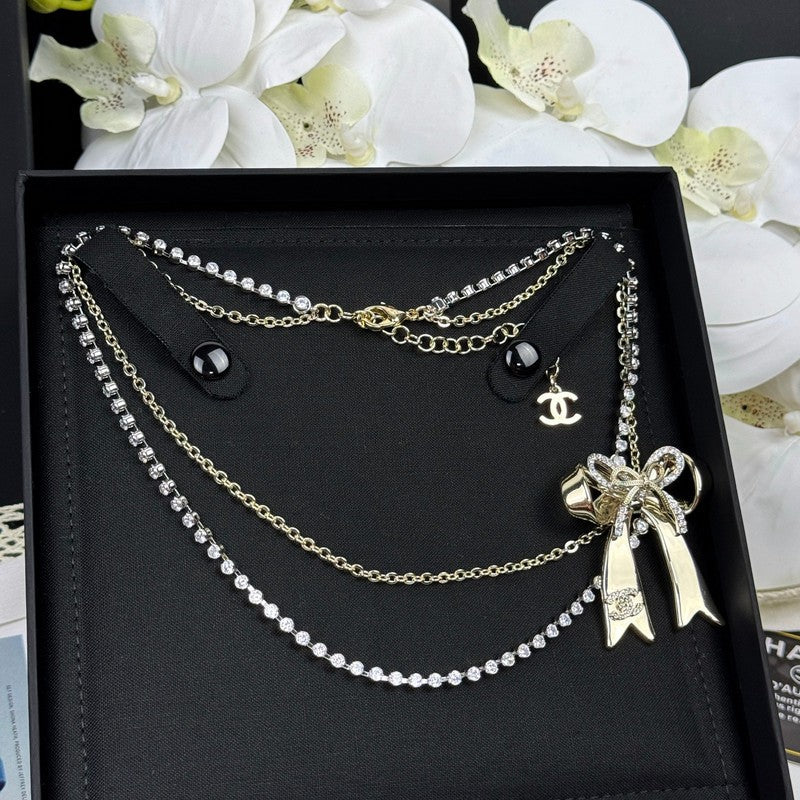 18K  Chanel 25K Bow Tie Diamond Gold Necklace
